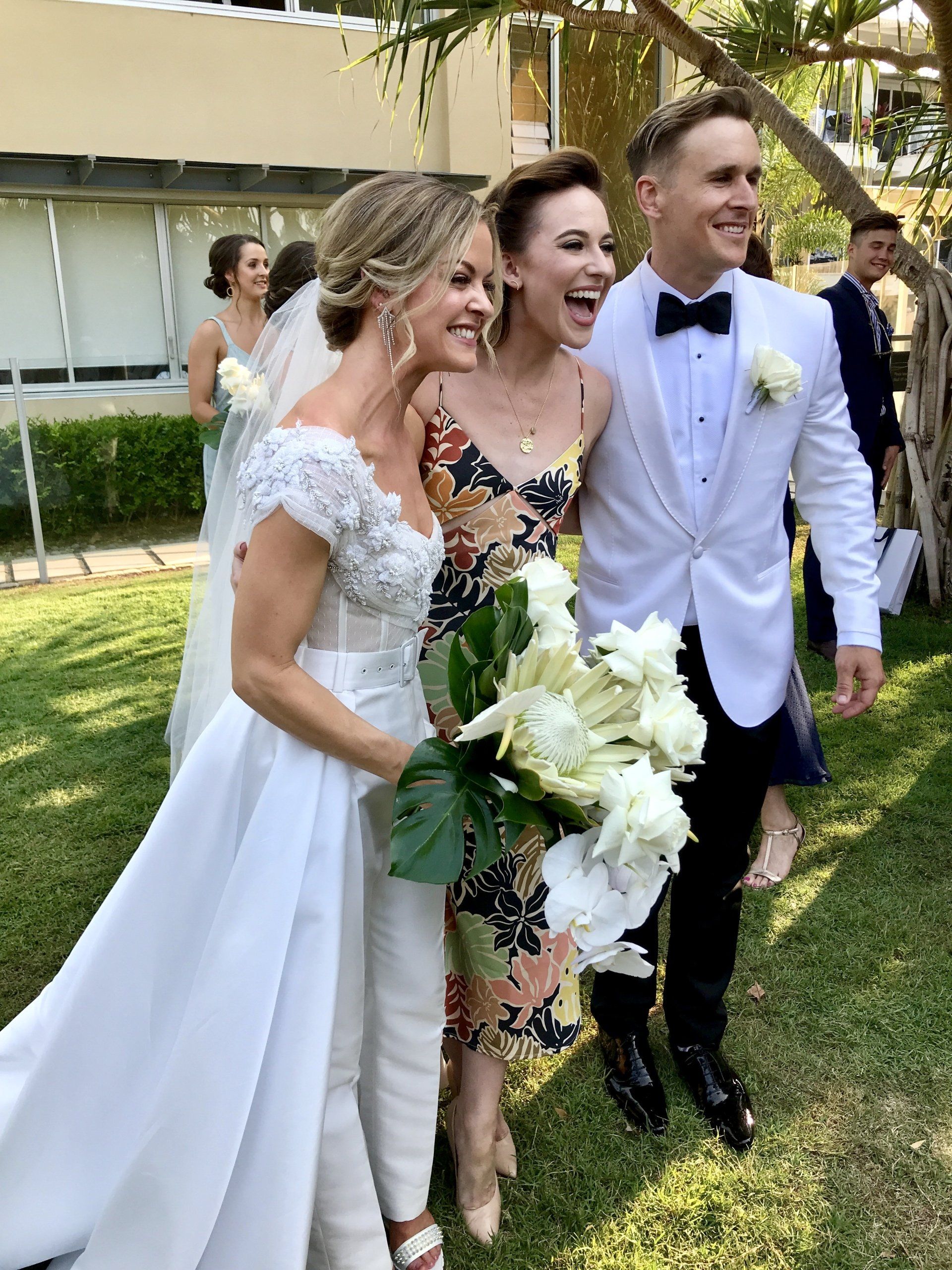 wedding couple with their frind opera singer who sang all the music for their Noosa wedding