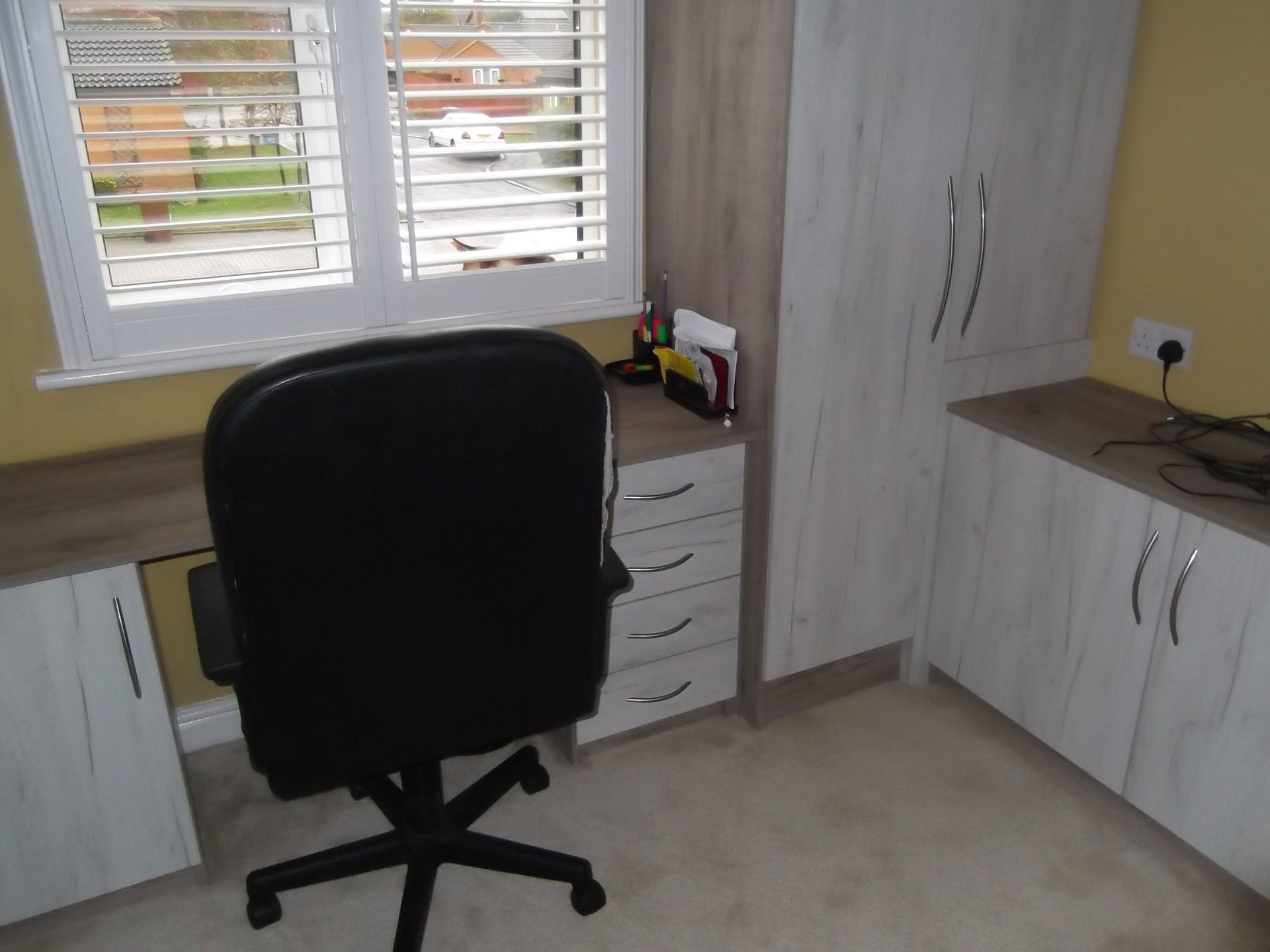 Desk and storage cupboard