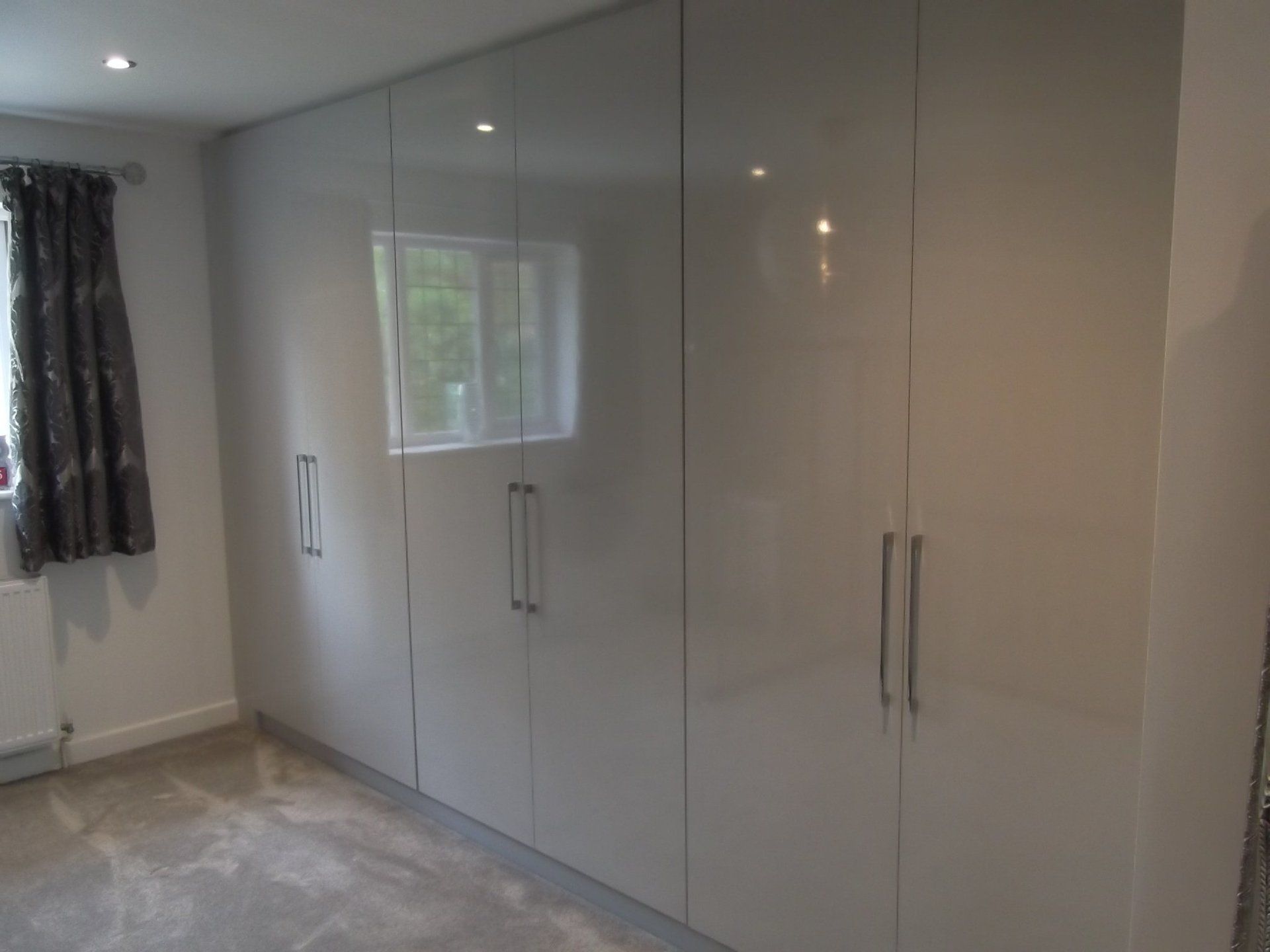 high gloss fitted wardrobes