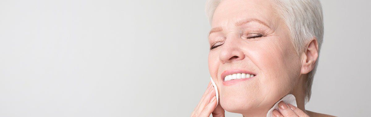 Senior Woman Skin Treatment — Gainesville, GA — Lanier Dermatology and Skin Cancer Specialist Senior Woman Skin Treatment — Gainesville, GA — Lanier Dermatology and Skin Cancer Specialist
