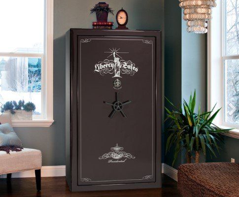 A large dark gun safe with the words