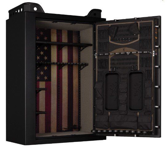 Black gun safe interior with American flag backdrop, shelves, and door organizer.