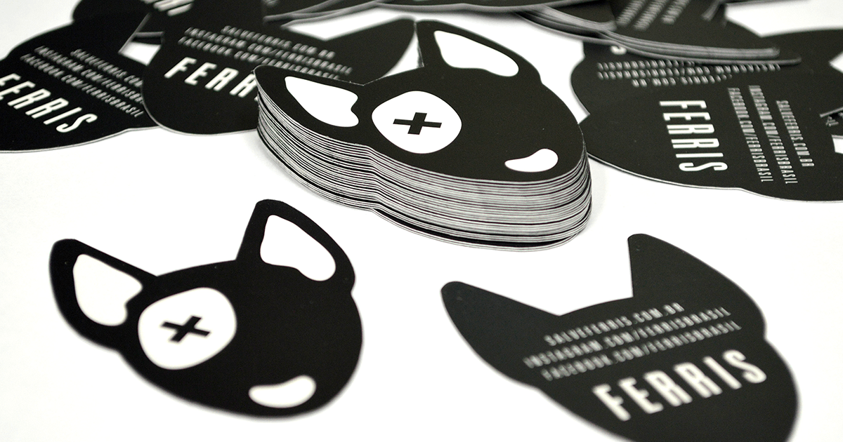 A stack of ferris business cards in the shape of a cat