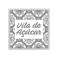 Um azulejo preto e branco com os dizeres vila de açúcar.