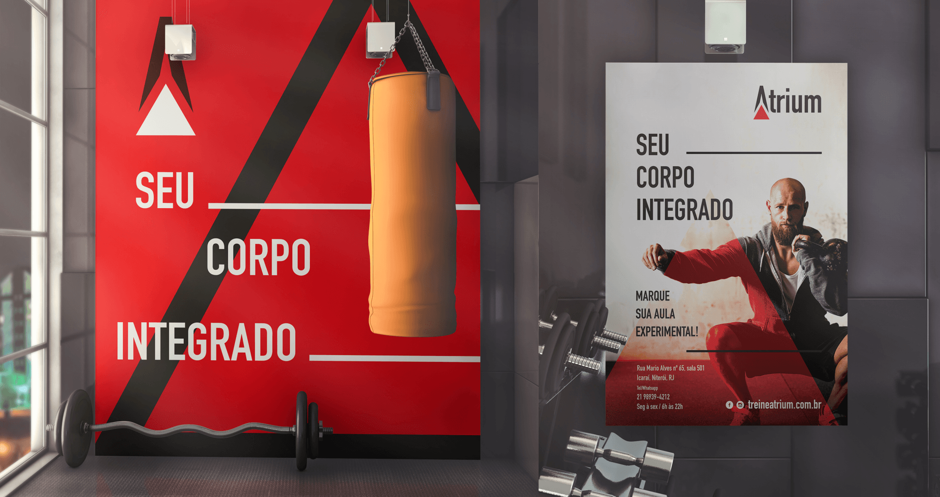 ATRIUM Um saco de boxe está pendurado na parede ao lado de uma placa que diz seu corpo integrado
