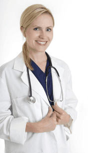 Blonde female doctor smiling, wearing a white coat and stethoscope. Hands are clasped near her chest.