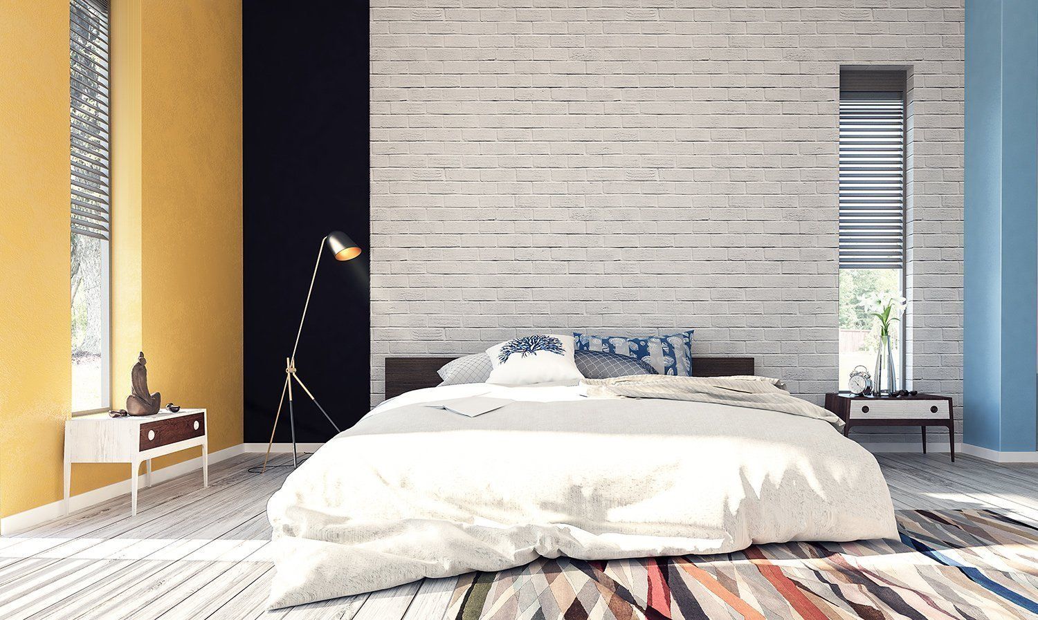 A bedroom with a bed , nightstand , lamp and rug.