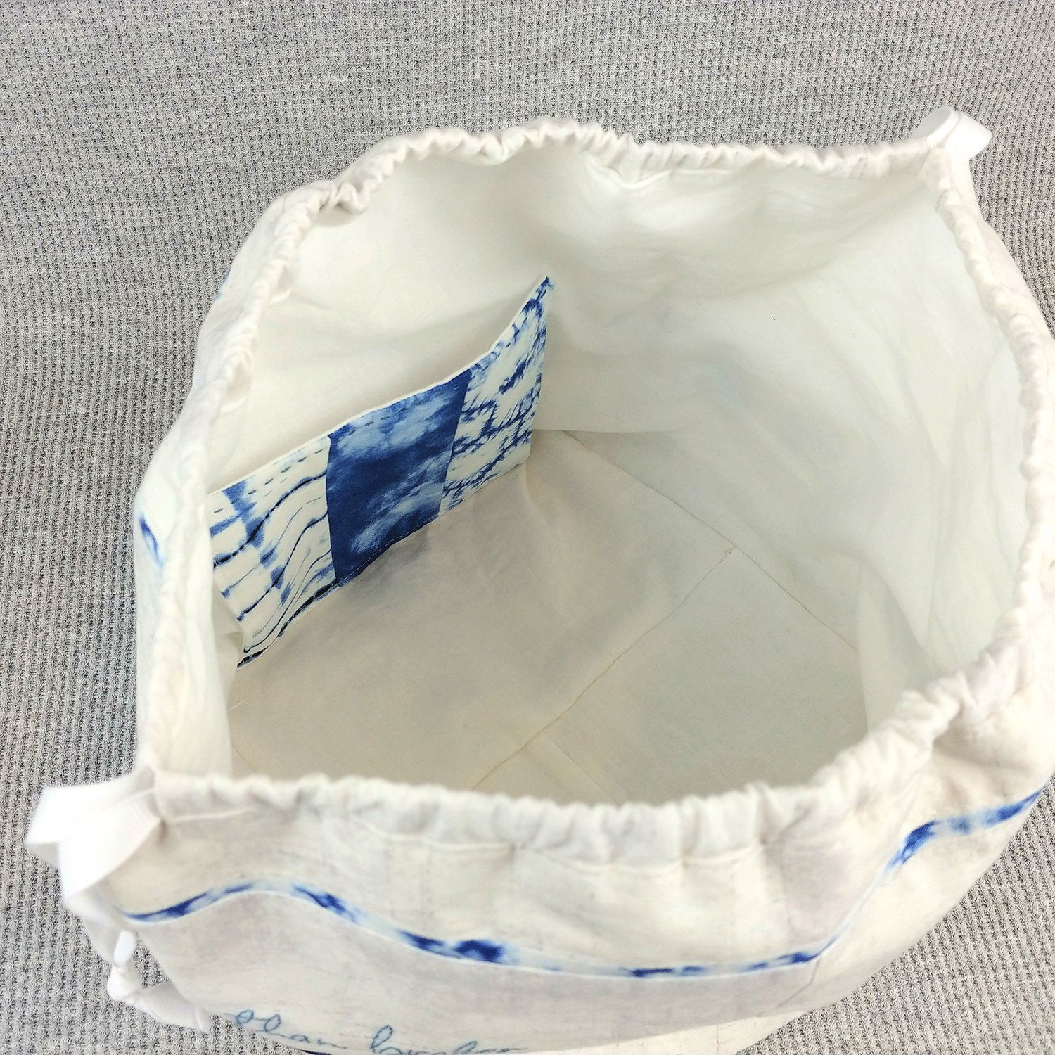 handmade drawstring bag from blue skin yarns story bag kintsugi