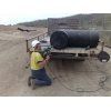 Large pipes and workman