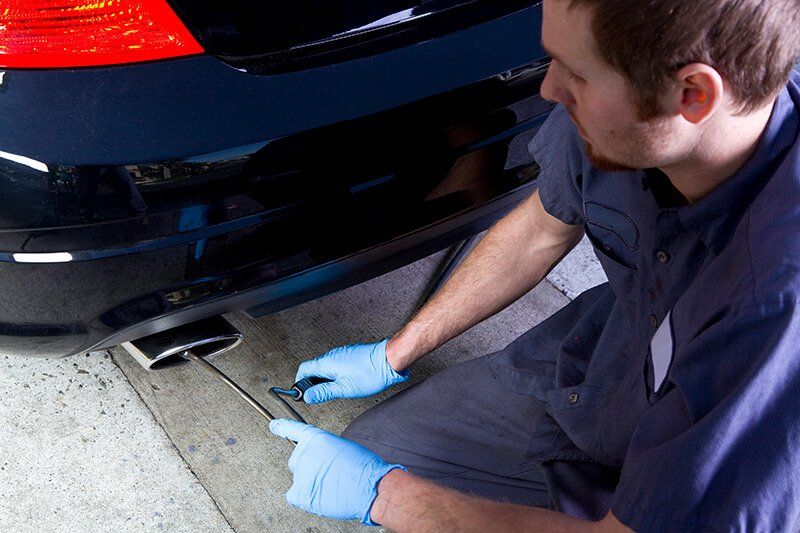 Exhaust repairing done by the mechanic