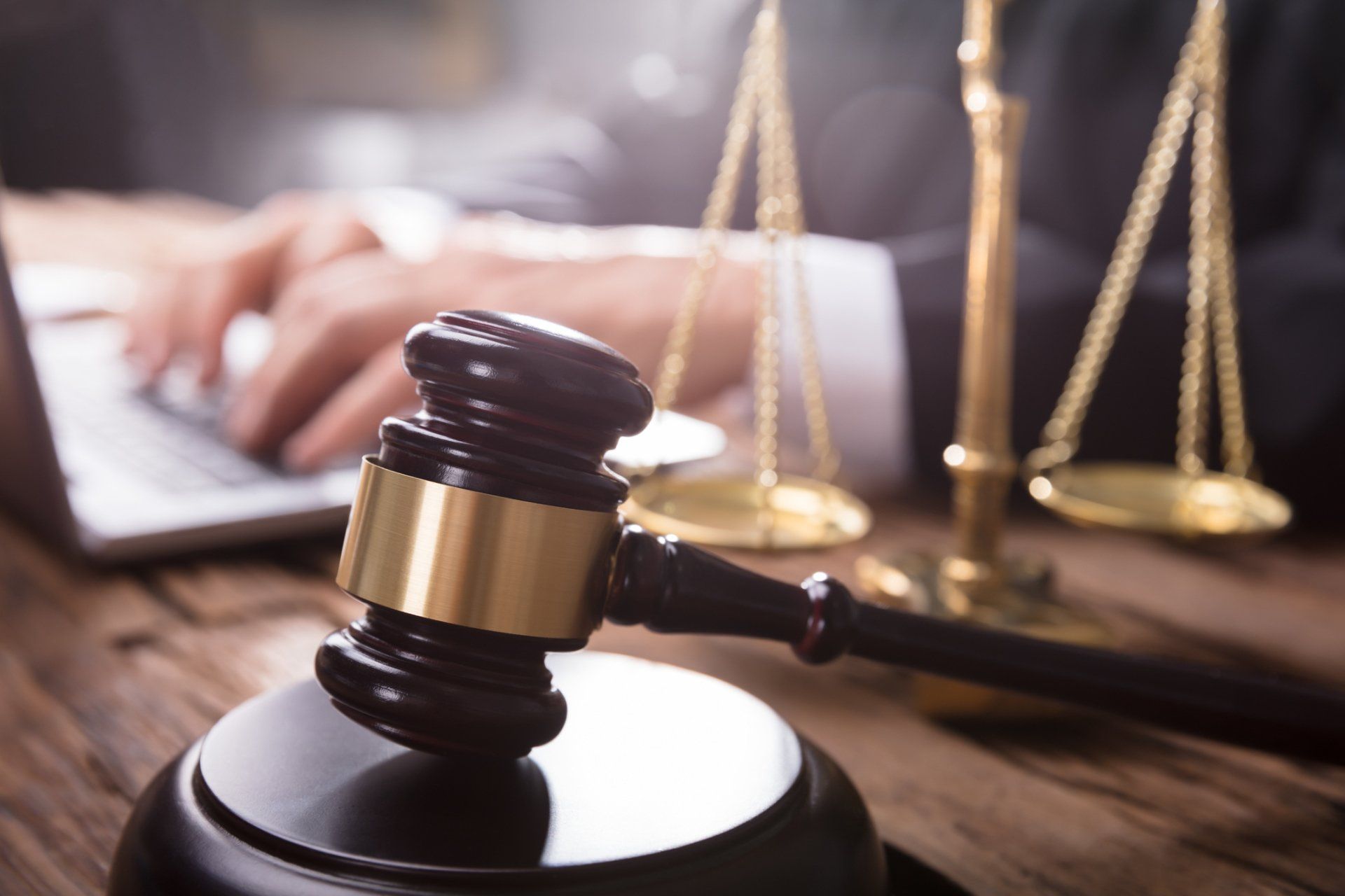 White-Colar Crimes — Attorney with Gavel and Justice Scale in Appleton, WI White-Colar Crimes — Attorney with Gavel and Justice Scale in Appleton, WI
