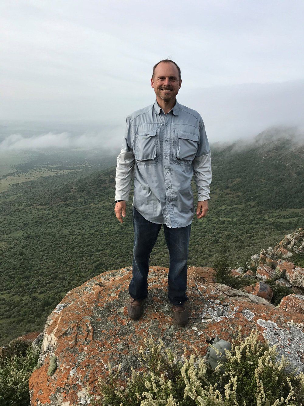 Man Standing on Cliff — Bradford, FL — Bowen & Bug Blocker Service