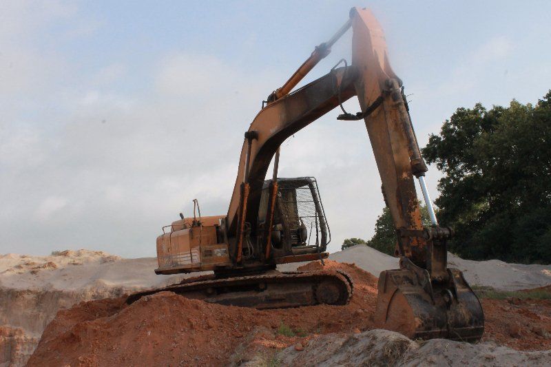 Rios Trucking Company bulldozer clearing land for house pad, road construction, 