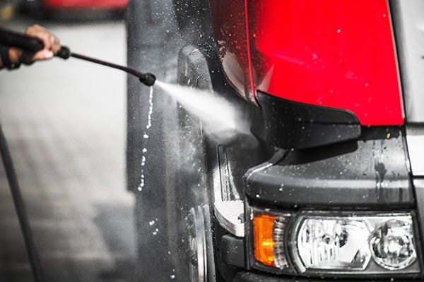 Driver Washing His Truck Using High Pressure Cleaner — Myerstown, PA — Your Choice Specialties
