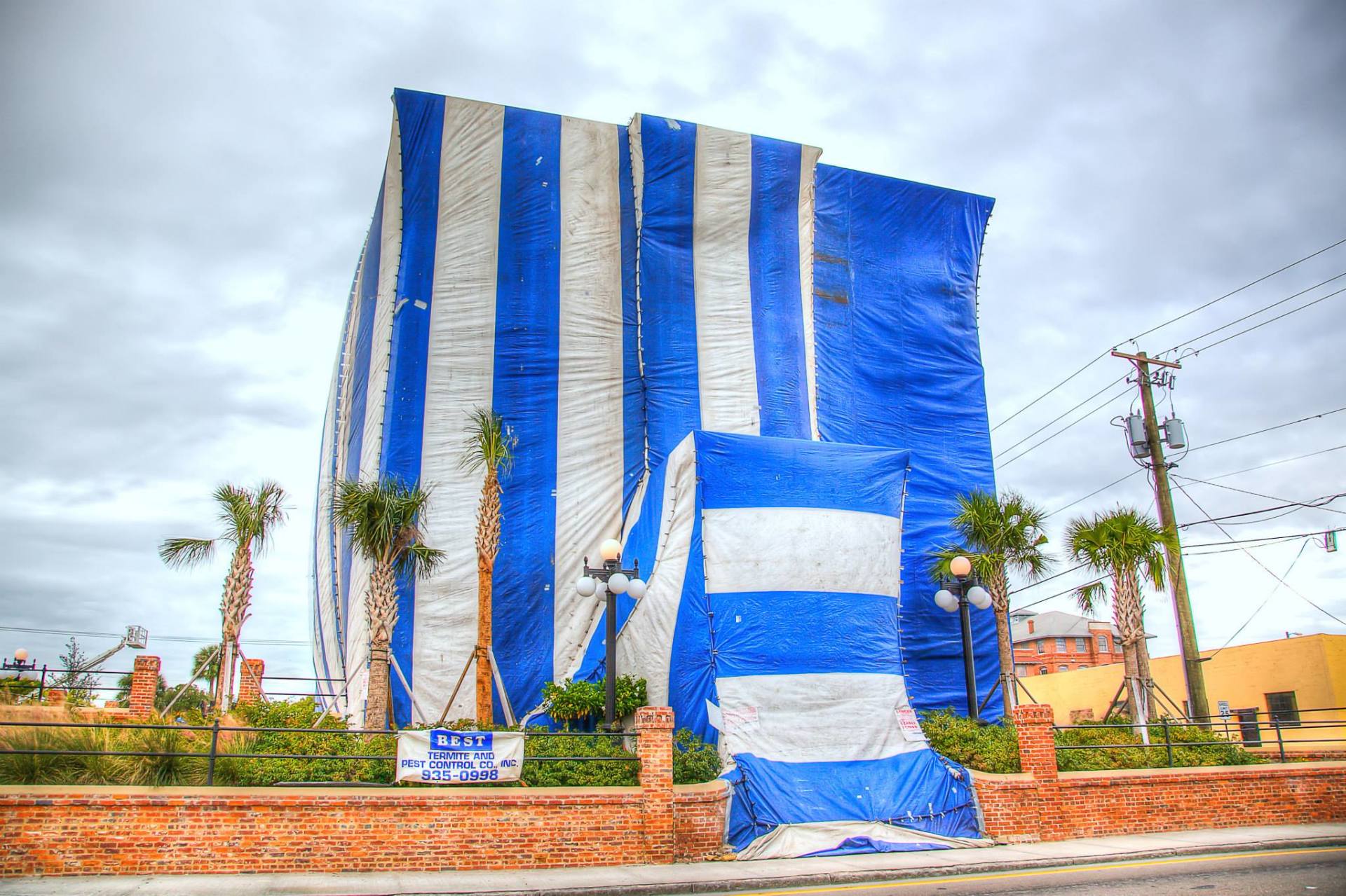 Termite Fumigation — House is Covered by Tent for Fumigation in Tampa, FL Termite Fumigation — House is Covered by Tent for Fumigation in Tampa, FL