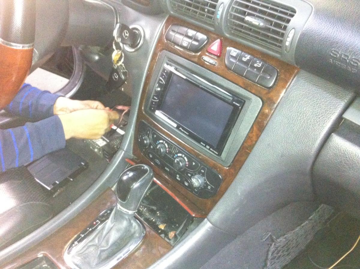 rewiring work on interior driver's side of vehicle