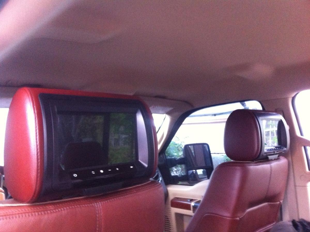 screens in the back of headrests for backseat passengers