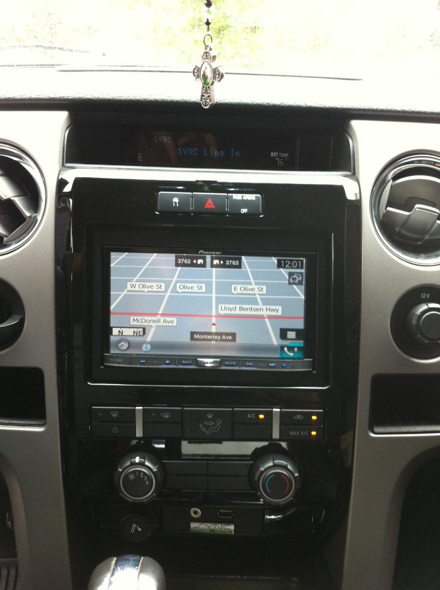 GPS on large screen in center console of vehicle