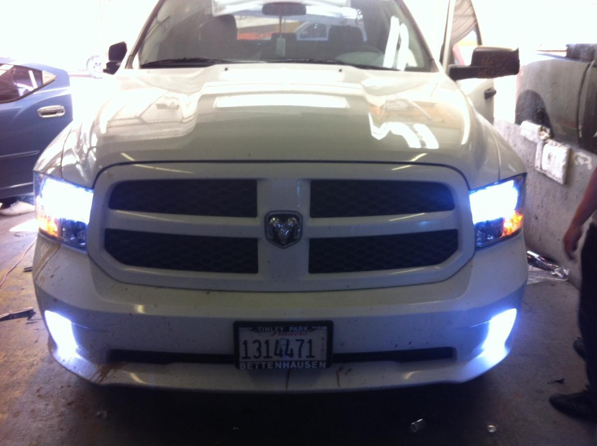 HID lights on white truck