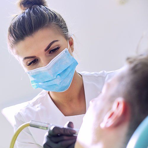 Woman Dentist And Client — Leominster, MA — Lanza Dental Office