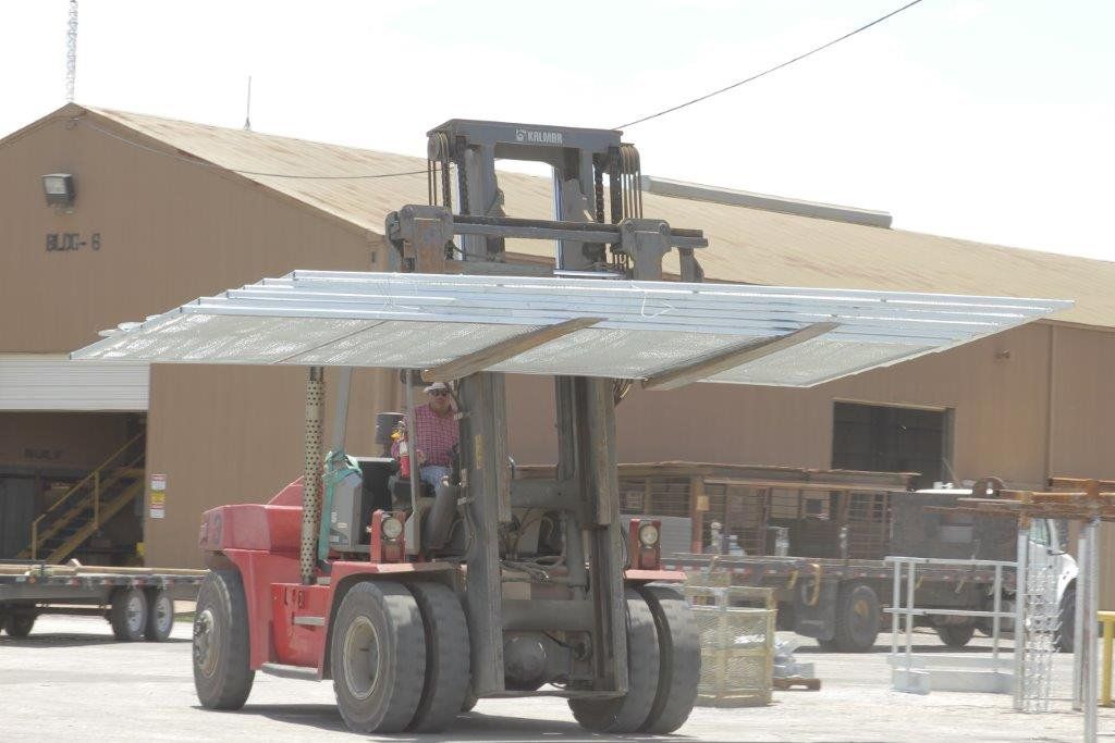 Moving Galvanized Steel using Forklift — Houston, TX — Southwest Galvanizing