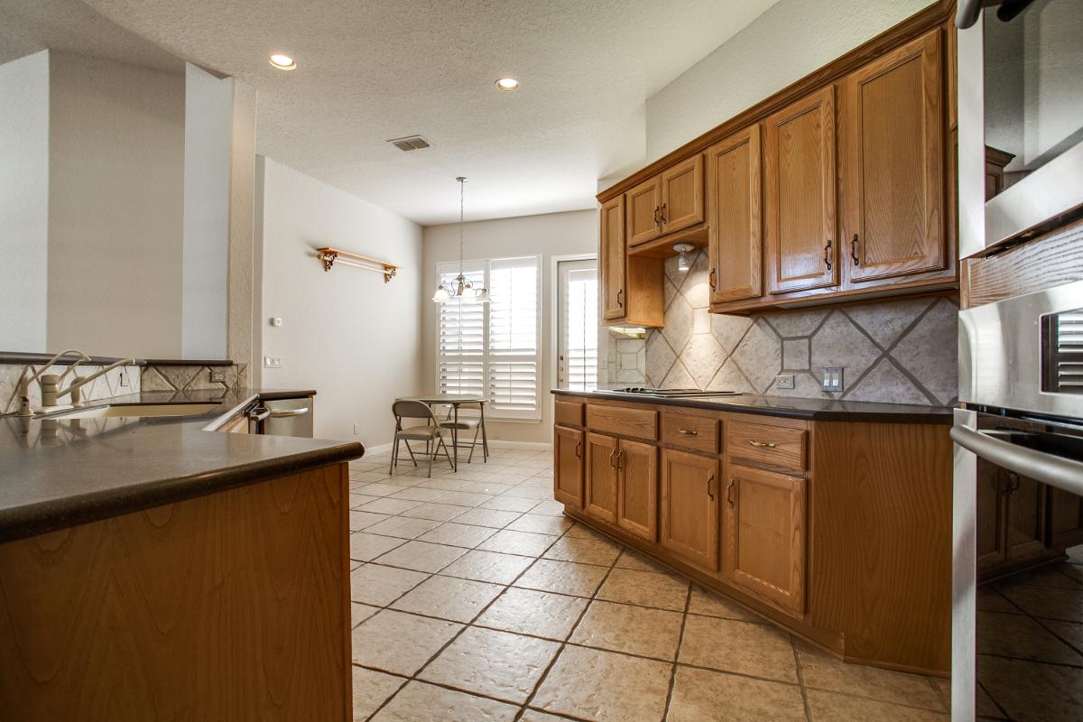 kitchen cabinets and tile flooring part of remodel