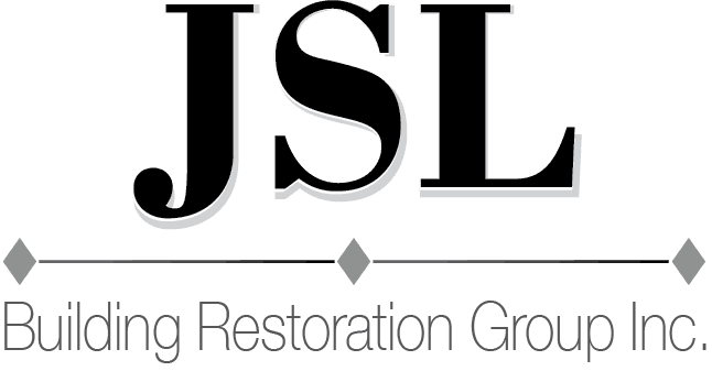A black and white logo for jsl building restoration group inc.