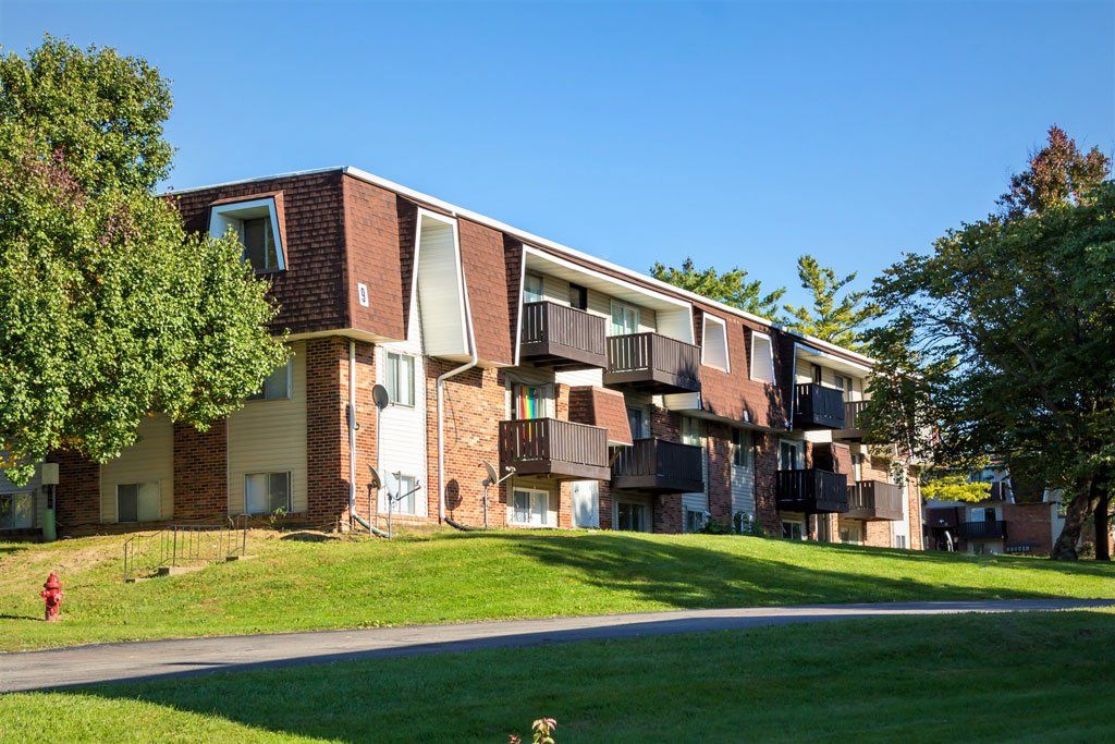 The Village on University Building Exterior in Spring