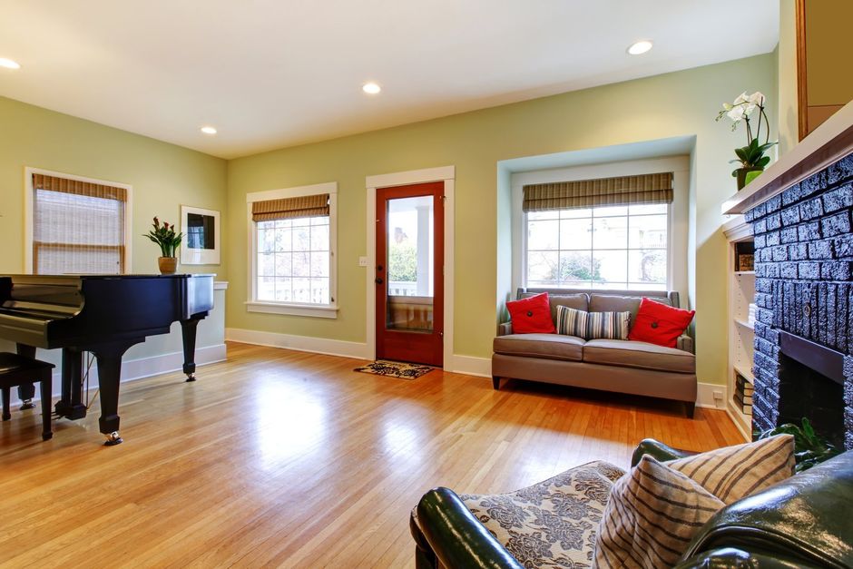 living room with a piano