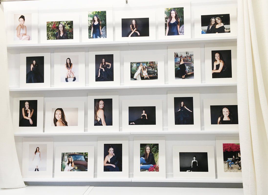 A wall with a lot of pictures on it
