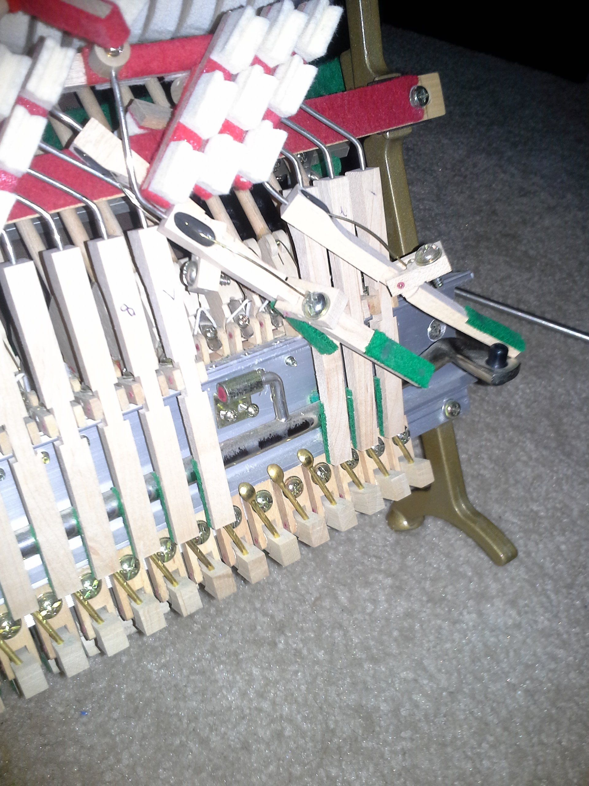 upright action sustain rod hinge
