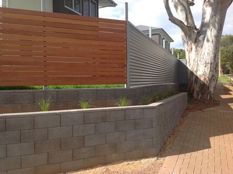 Timber retaining wall services by North East Landscaping Design & Construction