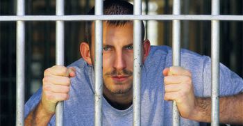Man behind bars