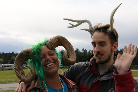 A man and a woman with horns on their heads