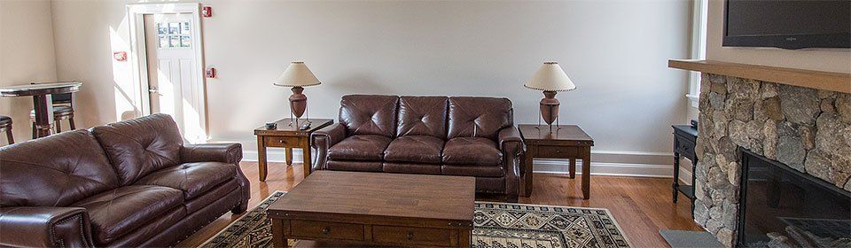 Image of a couch in our luxury lounge