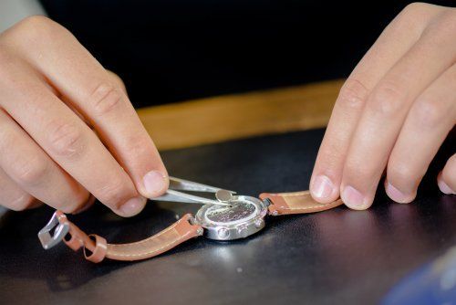 Garforth Cobbler professional changing the battery of a watch in Leeds