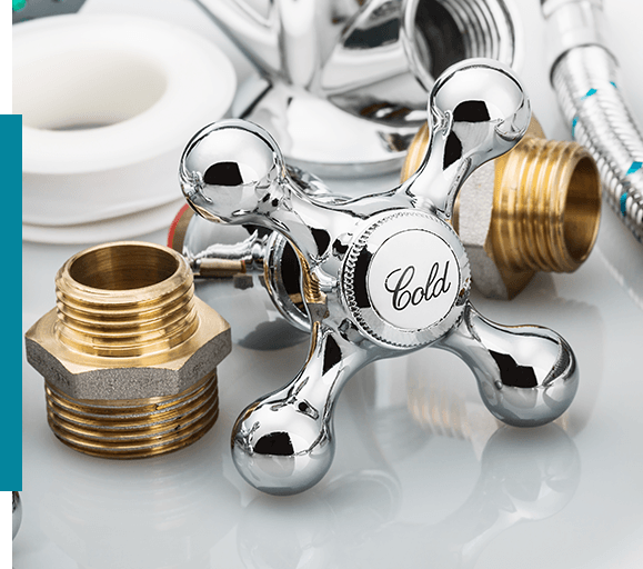 Plumbing and tools on a gray background