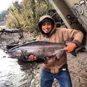 Man holding a fresh-caught fish