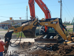 Excavator — Bloomington, IL — McLean County Asphalt Co.