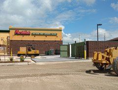 Commercial Excavation in Front of Commercial Building — Bloomington, IL — McLean County Asphalt Co.