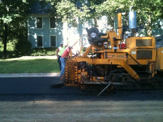 Paving Machine and The Workers — Bloomington, IL — McLean County Asphalt Co.