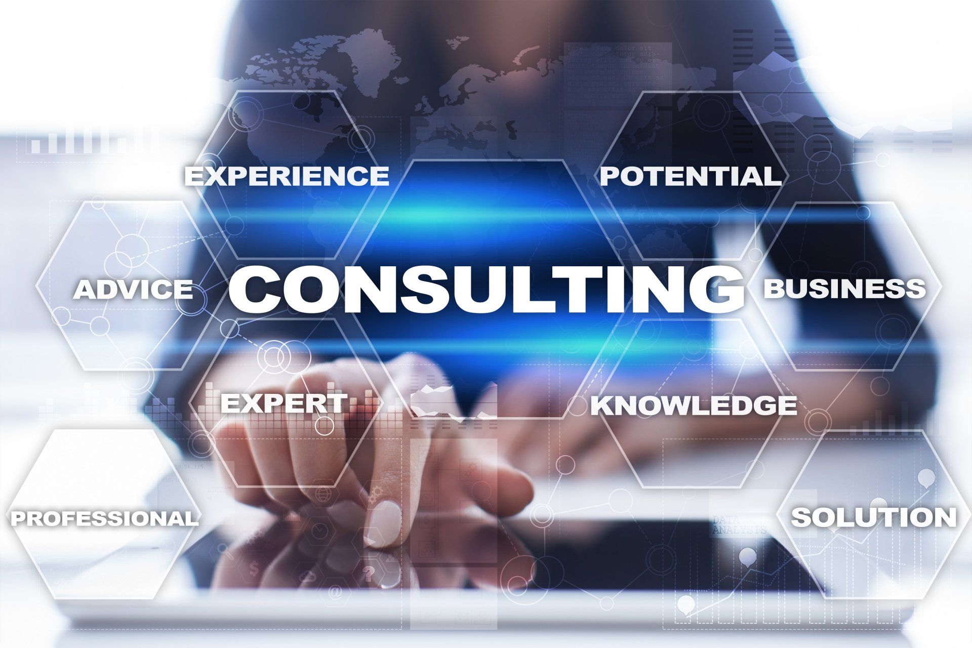 A woman is using a tablet with the word consulting on the screen