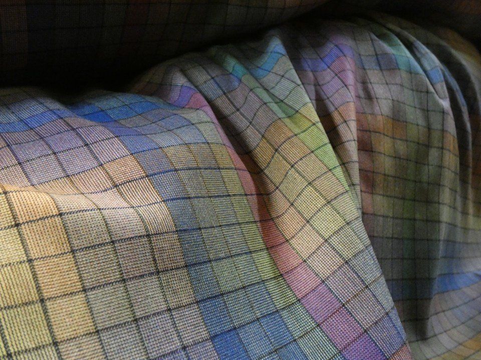 tessuto invernale con fantasia a quadri di vari colori