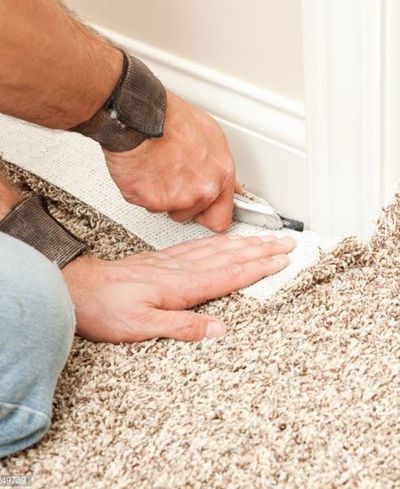 Carpet Installation —   Man Installing Carpet in Reno, NV
