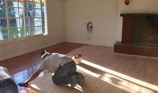 Man Polishing Wood Flooring — Los Angeles, CA — K & Z Hardwood Flooring