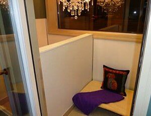 Dog Services — Room Suite with Chandelier in Lansing, MI