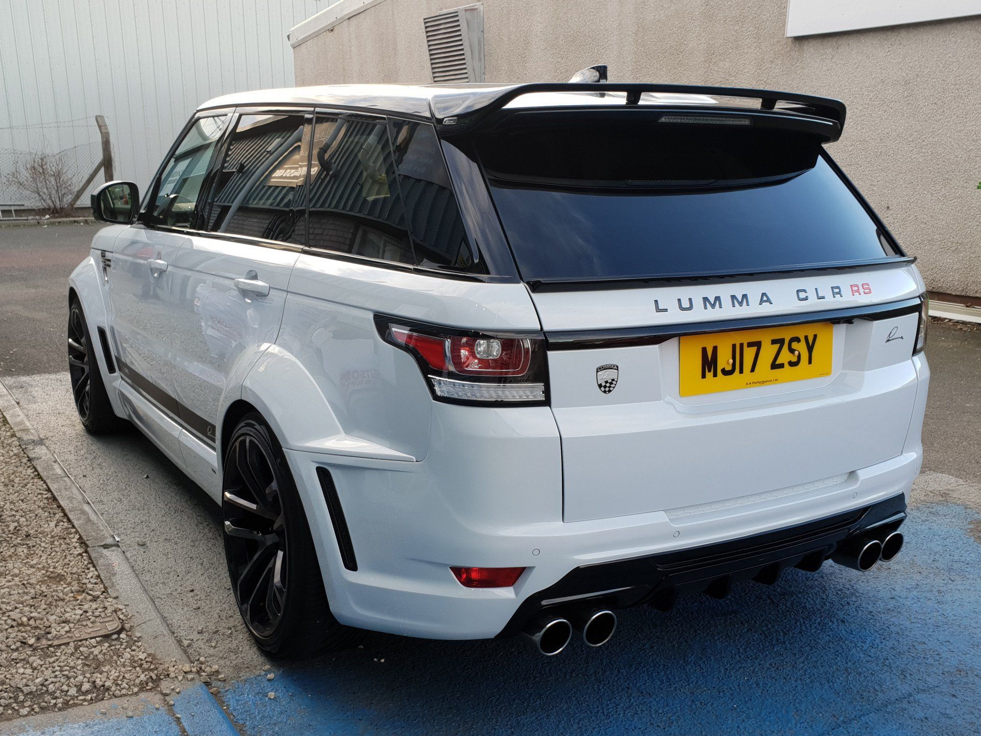 Car decals on a Range Rover in white, rear view