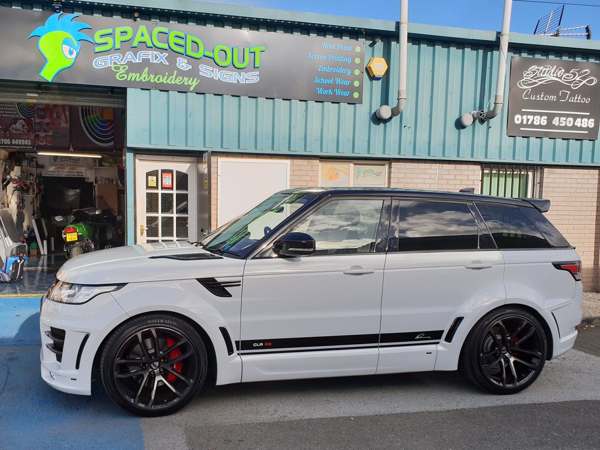 Car decals on a Range Rover in white, side view
