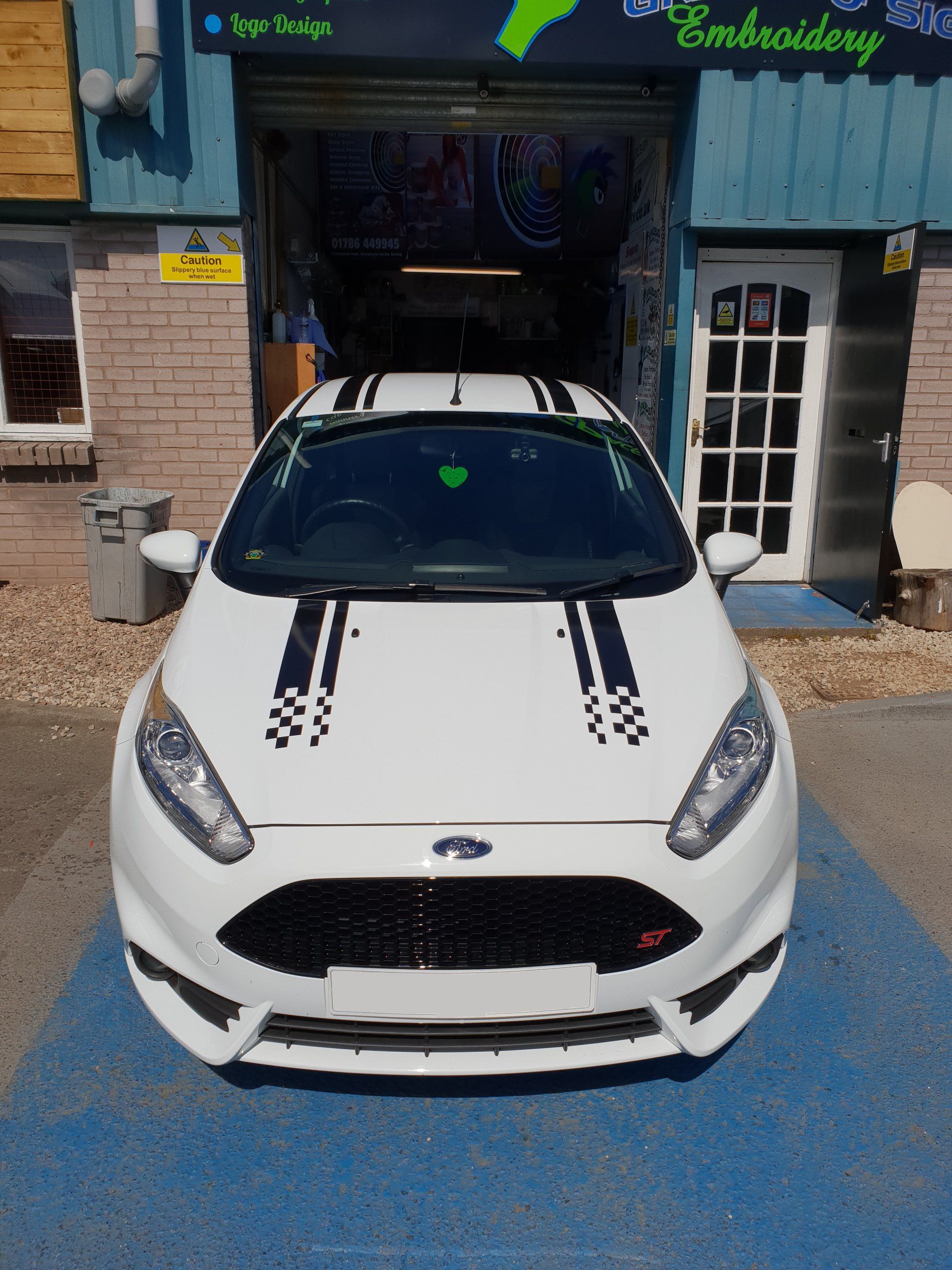 Car decals on Ford Focus in white