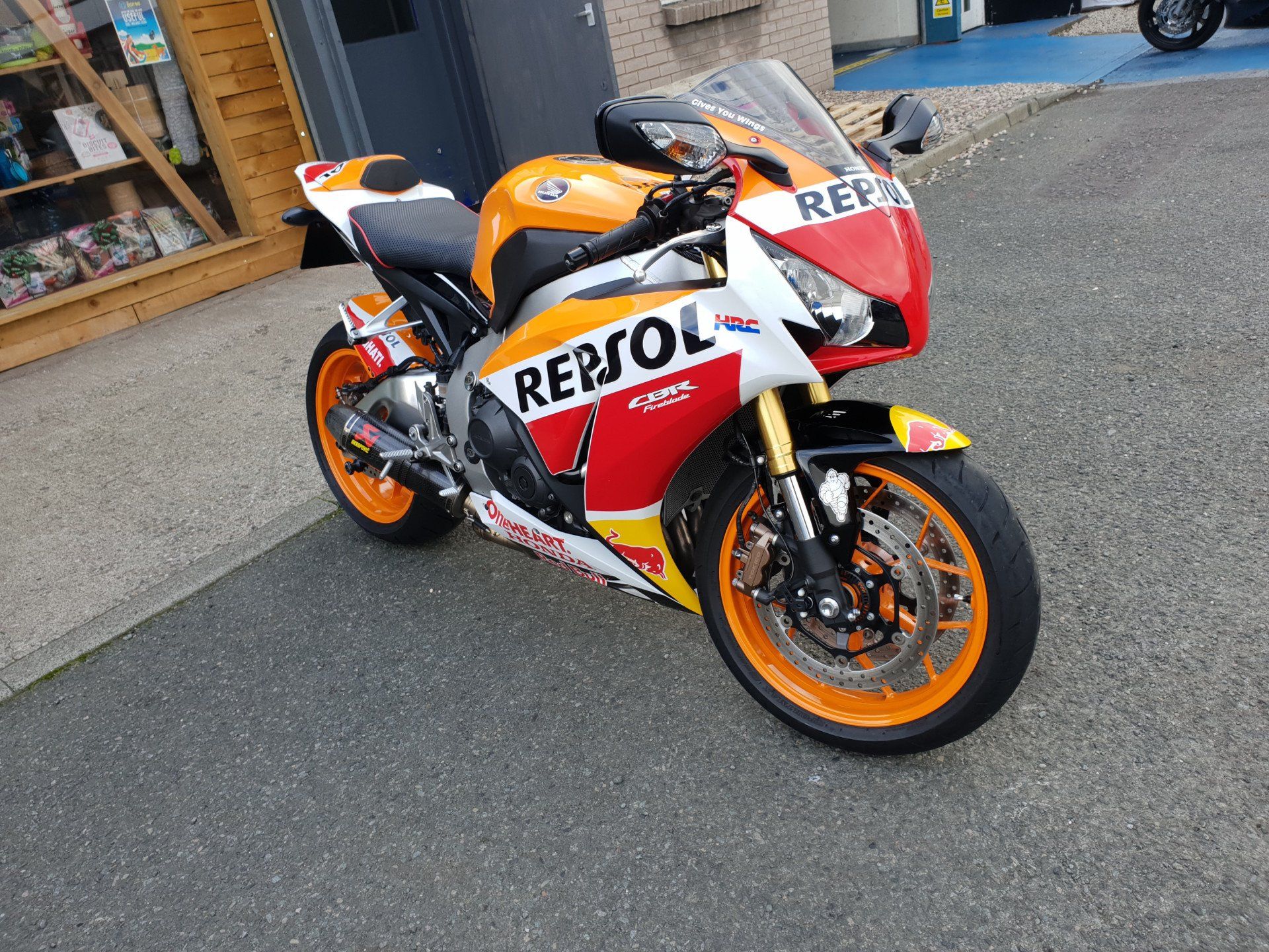 Repsol motorbike decals on a Honda